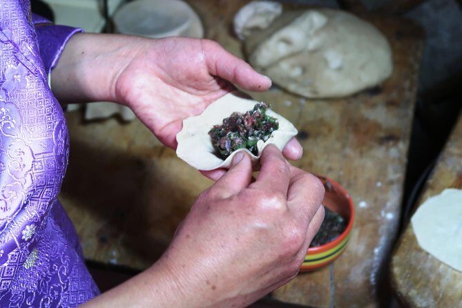 Cooking Class in a Traditional Ger Home in Ulaanbaatar Suburbs - Handmade Mongolian dishes: noodles, dumplings, and the meat question